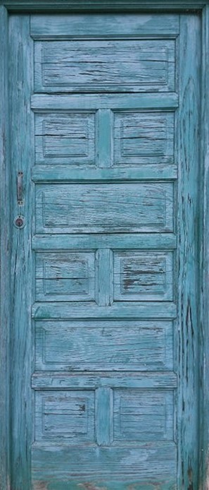 a faded blue door, alone